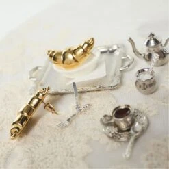 Aldo Croissants Glossy Metal Stud Earrings 9 Aldo Croissants Glossy Metal Stud Earrings -The Aldo Shop product 14088495 croissants gold 710 look part sq gy