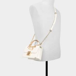 Aldo Amendaa White Quilted Top Handle Mini Bag with Gold Arc Handle -The Aldo Shop product 14141387 amendaa white 100 002 029 alt3 sq gy