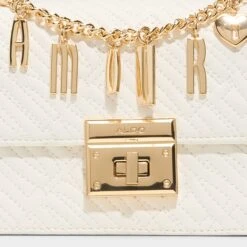 Aldo Amendaa White Quilted Top Handle Mini Bag with Gold Arc Handle -The Aldo Shop product 14141387 amendaa white 100 002 029 detail sq gy