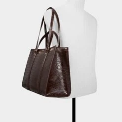 Aldo Ninetofivee - Glossy Espresso Croc Structured Tote Bag 11 Aldo Ninetofivee - Glossy Espresso Croc Structured Tote Bag -The Aldo Shop product 14141582 ninetofivee brown 204 002 029 alt3 sq gy