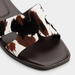 Aldo Itsandal Cow-Print Haircalf Cut-Out Slides -The Aldo Shop product 14163403 itsandal brown 241 001 037 alt4 sq gy